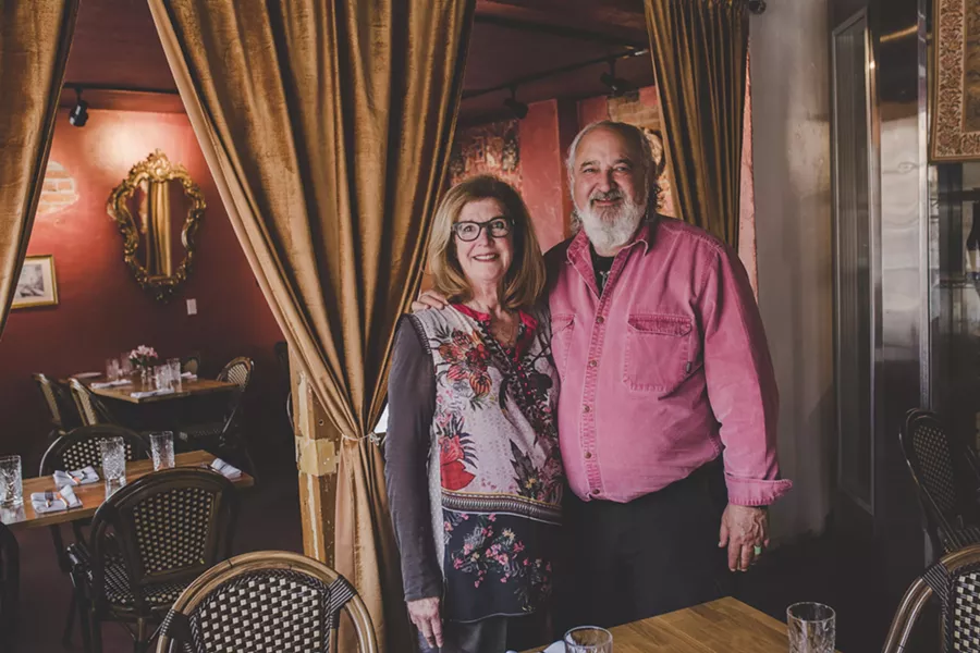 French Market owners Judy and Phil Lipton in the French-inspired dining room. - TAMBI LANE