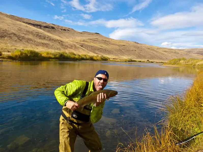 No, the author did not eat this steelhead raw; native fish such as this one require catch and release. - HANS VOGNILD