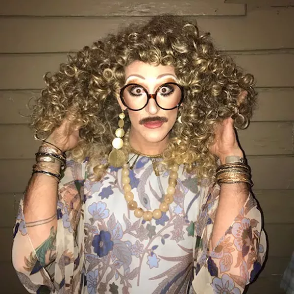 D'Auntie Carol takes pride in sporting a mustache with her fab fem look. - JAMES GRAY