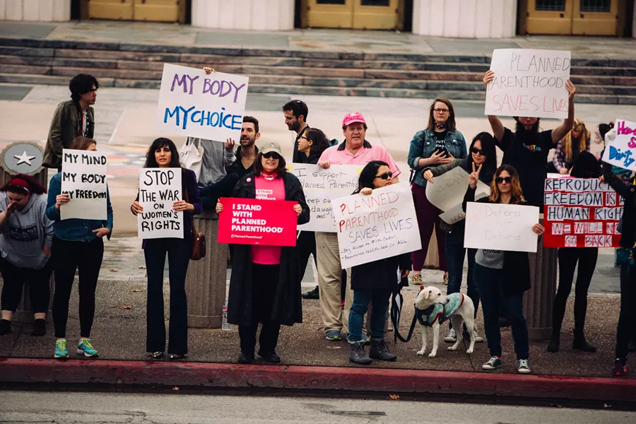 Protestors rally in support of Planned Parenthood in Los Angeles, 2017. - MOLLY ADAMS, FLICKR