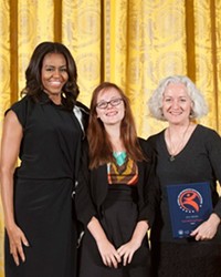 First Lady Michelle Obama with Caldera Arts student Alena Nore and Caldera Executive Director Tricia Snell.