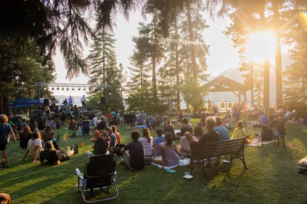 Music lovers take in an intimate lakeside evening performance at the scenic Suttle Lodge. - SUTTLE LODGE