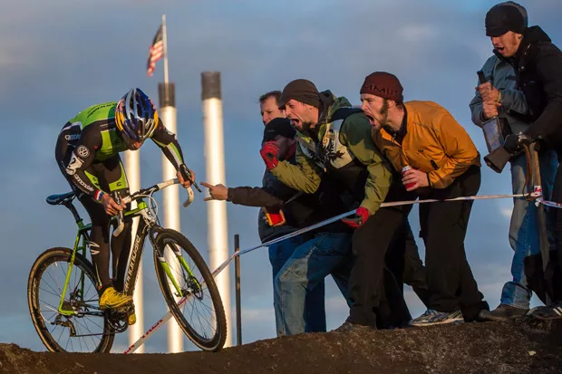 Tim Johnson jams during a 2012 cyclocross race in Bend and gets heckled by spectators. - MATTHEW LASALA
