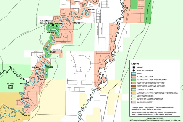 A Deschutes County map shows the no-shooting areas along the Deschutes River between Sunriver and La Pine State Park. It also shows the two small areas shaded in brown between river mile posts 200 and 201—federal land where shooting is allowed during waterfowl season. - DESCHUTES COUNTY