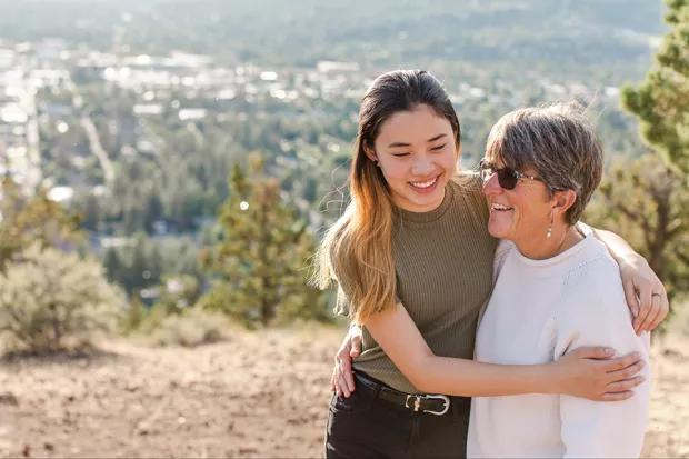 Emily Krehbiel shares a smile with Mom, Joanie. - NATALIE STEPHENSON