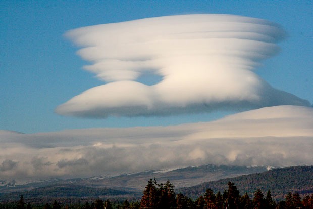 Standing lenticular clouds over the Cascades. - JIM ANDERSON