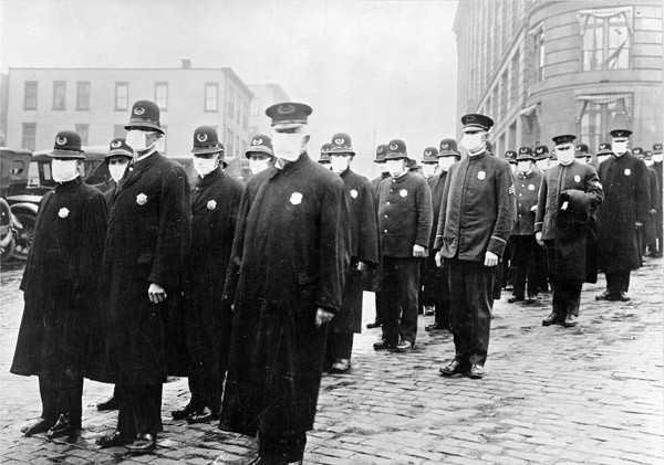 The Seattle Police in 1918. Masks were mandatory in San Fransisco, but voluntary in Seattle, Washington and Portland. - CENTERS FOR DISEASE CONTROL AND PREVENTION