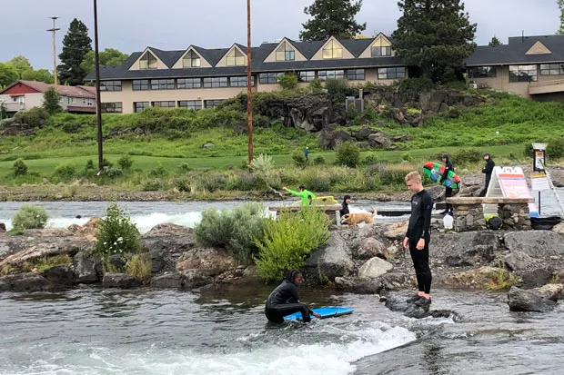 Another day, another man-made wave at Bend's Whitewater Park—even in spite of cool temps. - NICOLE VULCAN