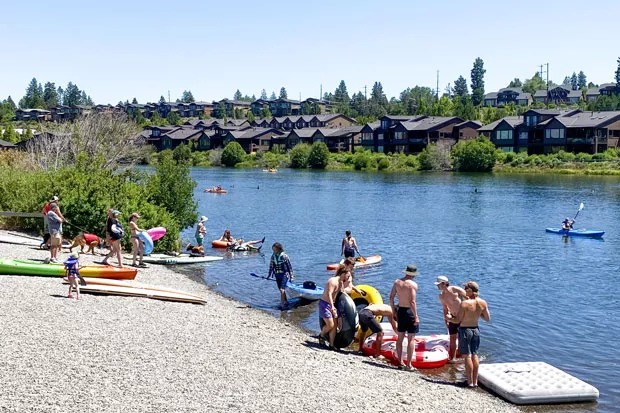 Even as COVID-19 cases continue to rise in Deschutes County, Riverbend Park was crowded with floaters and kayakers Monday afternoon. - KYLE SWITZER