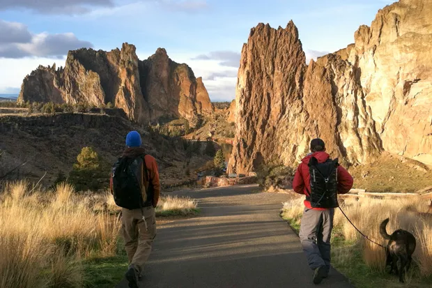 Climbers Matt Jones (left) and Wally Fox (right) set out on a day of climbing at Smith Rock. - COURTESY MAX TEPFER