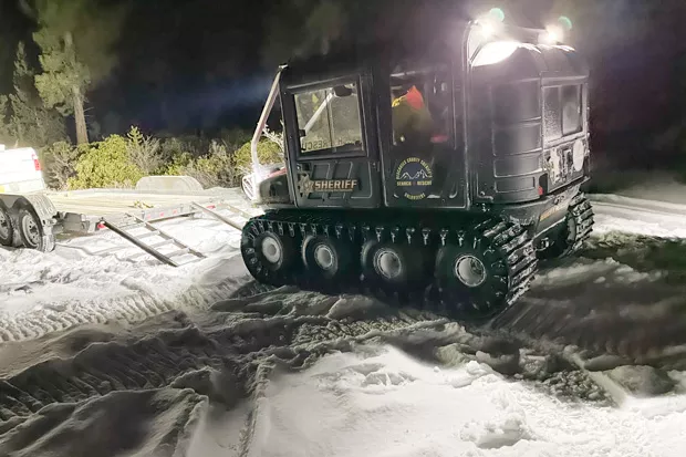 After a job well done, the savior Argo ATV trailers up for its next rescue. - JIM SIPE