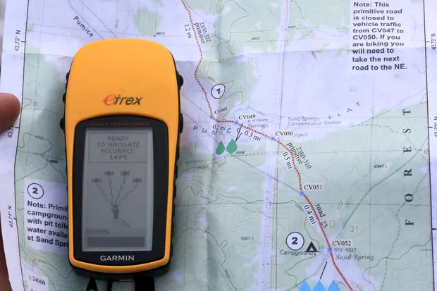 Navigating the Oregon Desert Trail with an Oregon Natural Desert Association map. - DAMIAN FAGAN