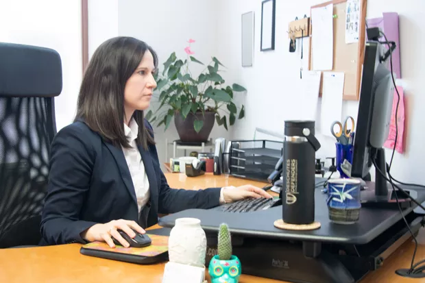 Katherine Griffith, an attorney at Deschutes Defenders, has to come back into the office from 8-midnight to prepare for trials. - JACK HARVEL