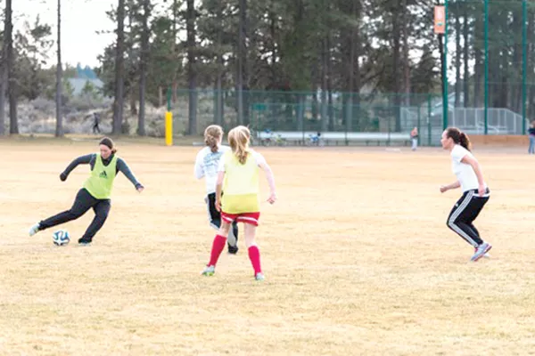 Back in pre-litigation times, Bend FC Timbers club members practice their craft. - PHOTO COURTESY OF TARA BILANSKI