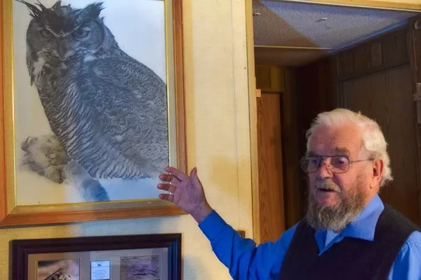 Jim Anderson shows a favorite photograph that he took. - JIM ANDERSON