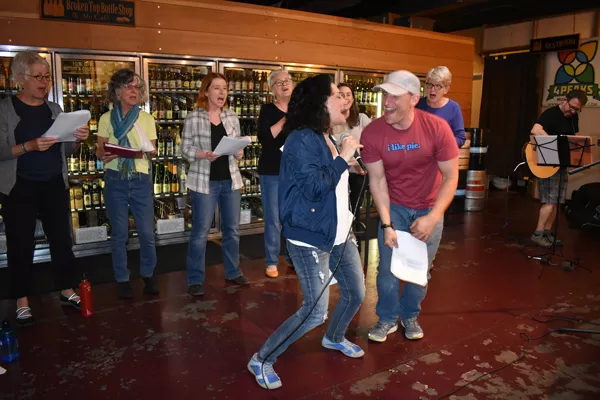 Singers in the Public (Rock) Choir belt one out through smiles of joy. - YOKO IKEDA