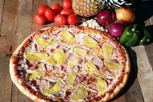 A teenager's fantasy... pineapple on pizza. - BEND PIZZA KITCHEN