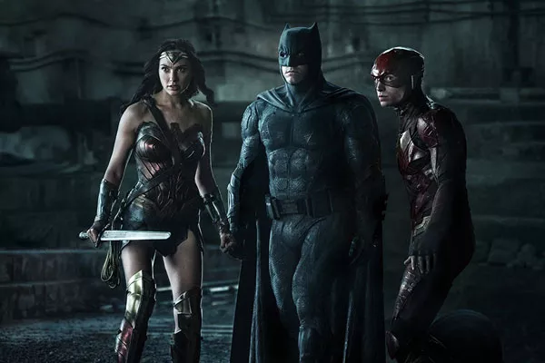 Not even the clever suits can help this film - CLAY ENOS