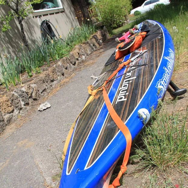 Innovative Transportation on the west side, #110: If you don't have a car and you want to transport gear—just McGyver your way. A skateboard, tubular webbing, a couple cam straps, carabiners and some bungee cords go a long way. - K.M. COLLINS