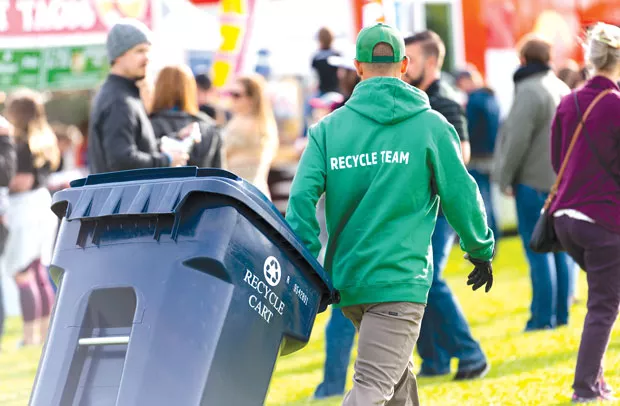 Venues including the Les Schwab Amphitheater and the Athletic Club of Bend use The Broomsmen to sort and dispose of recycling—one of a few steps the teams at local venues take in the name of sustainability. - TYLER ROWE