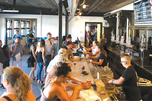 A frenetically busy start to Boneyard's new restaurant. - KEVIN GIFFORD