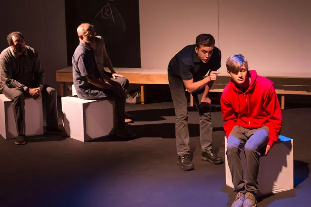 Ed (Craig Brauner) tries to communicate with Christopher (Spencer Johnson, seated). - ARTON PHOTOGRAPHY