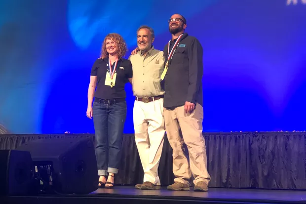 10 Barrel's Tonya Cornett and Ian Larkin accept their GABF awards from Brewers Association founder Charlie Papazian. - PHOTO BY KEVIN GIFFORD