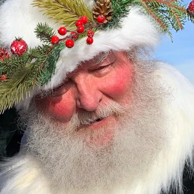 @joyfulrandom beams in this photo of ol' Saint Nick. Ho Ho Ho! Tag @sourceweekly to show up in Lightmeter. - SUBMITTED