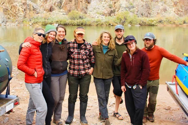 The "farmily" at the Colorado River Dimond Creek takeout. L-R: Author K.M. Collins, Carly Maher, Aliza Rosenstei, Sarahlee Lawrence, Cailyn Brierley, Kyle McKnelly, Bridget Dahmer and Steven McKnelly. - K.M. COLLINS