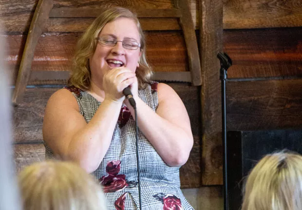 Katy Ipock performs at the Galentine's Day Comedy Showcase at Craft Kitchen & Brewery. - KEELY DAMARA