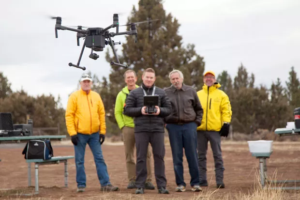 Members of the DCSO SAR Air Operations Team practice flying a drone. - DCSO SEARCH AND RESCUE