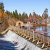 The Newport Avenue dam was first built in 1909, creating Mirror Pond. At the time, it provided an abundant source of power for the small town of Bend. Today it provides enough power for less than 1,000 Bend homes. The Newport Avenue dam was first built in 1909, creating Mirror Pond. At the time, it provided an abundant source of power for the small town of Bend. Today it provides enough power for less than 1,000 Bend homes.