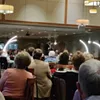 National Pulse Editor in Chief Raheem Kassam stands center stage in Bend Golf Club's dining hall on Wednesday, Aug. 25, for a sold-out fundraiser. National Pulse Editor in Chief Raheem Kassam stands center stage in Bend Golf Club's dining hall on Wednesday, Aug. 25, for a sold-out fundraiser.