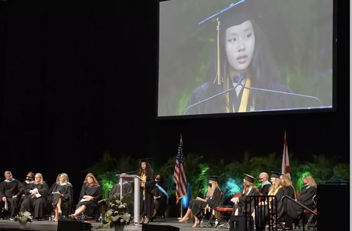 Rachel Cheng delivers her salutatorian speech at the BB&T Center in Sunrise on June 8. - COURTESY OF RACHEL CHENG