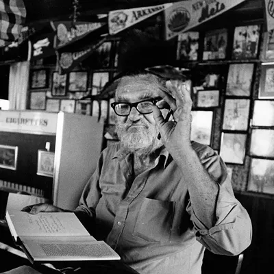 Les Hemingway signs copies of his book My Brother, Ernest Hemingway at Brown's Hotel in Bimini in 1981.
