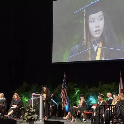 Rachel Cheng delivers her salutatorian speech at the BB&T Center in Sunrise on June 8.