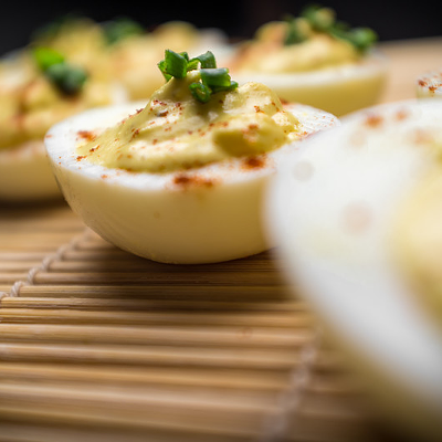 deviled eggs on wooden dowel placemat