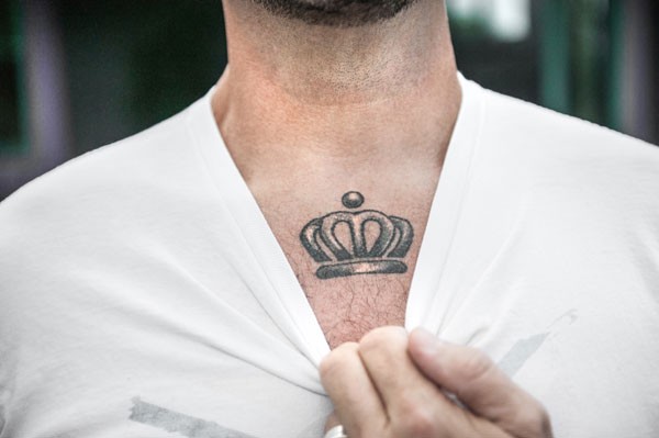 A closeup of Scott Lindsley's tattooed chest
