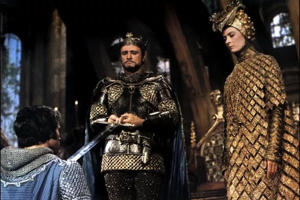 A KNIGHT TO REMEMBER: Franco Nero (kneeling), Richard Harris and Vanessa Redgrave in Camelot (Photo: Warner Bros.)