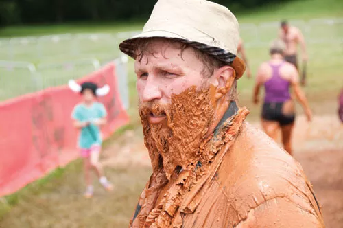 A participant after the Warrior Dash in May in at Rural Hill. (Photo by Jeffrey Oyler)