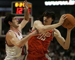 Adam Morrison - AP/JEFF ROBERSON