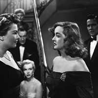 ALL THE WORLD'S A STAGE: Anne Baxter (left) and Bette Davis in All About Eve.