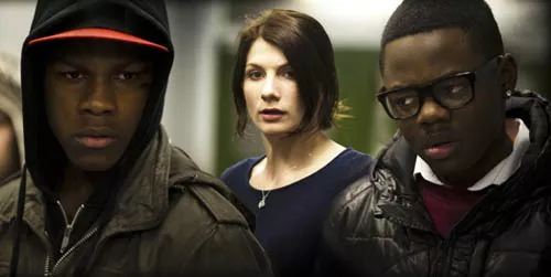 ANARCHY IN THE U.K.: Moses (John Boyega), Sam (Jodie Whittaker) and Jerome (Leeon Jones) confront an alien invasion in Attack the Block. (Matt NettHeim / Screen Gems)