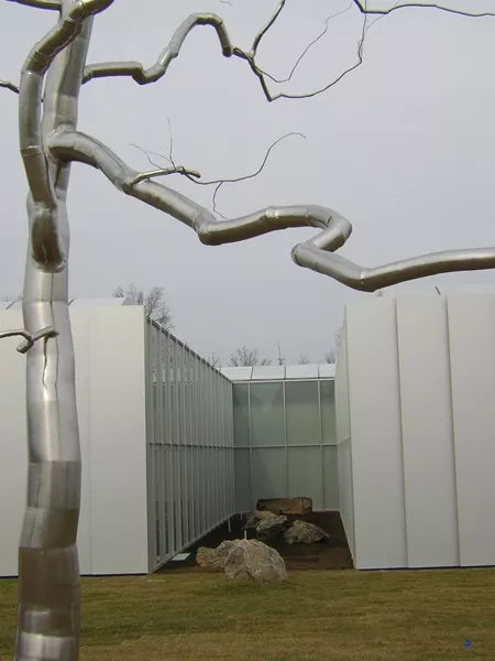 "Askew" &#151; sculpture by Roxy Paine, framing one of the new sculpture courtyards