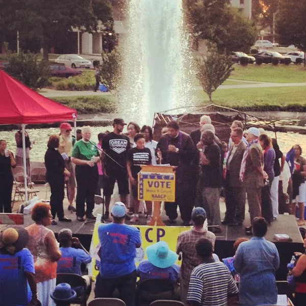 Barber addresses the crowd.