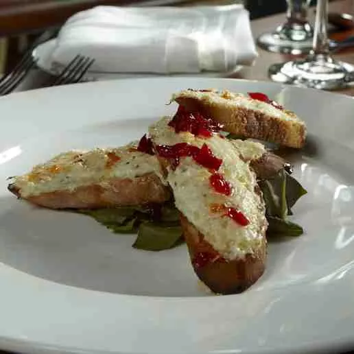 Blue Crab and ricotta crostini with a spicy chili jam.