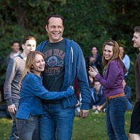 Britt Robertson (hugging) and Vince Vaughn in Delivery Man. (Photo: DreamWorks)