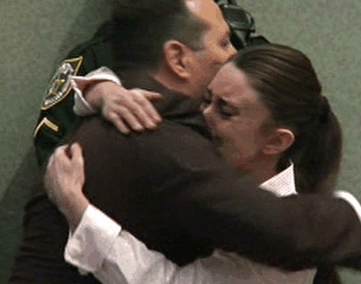 Casey Anthony hugs her attorney after being found not guilty of murder