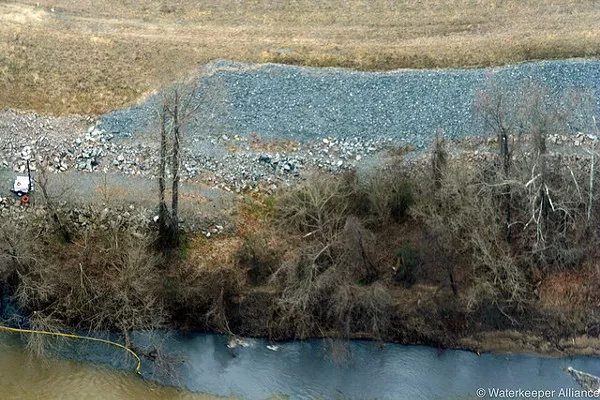 Coal ash spills into the Dan River.