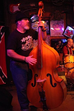 Drew Badger of JT and the Dragpipes at Puckett's Farm Equipment on July 9.